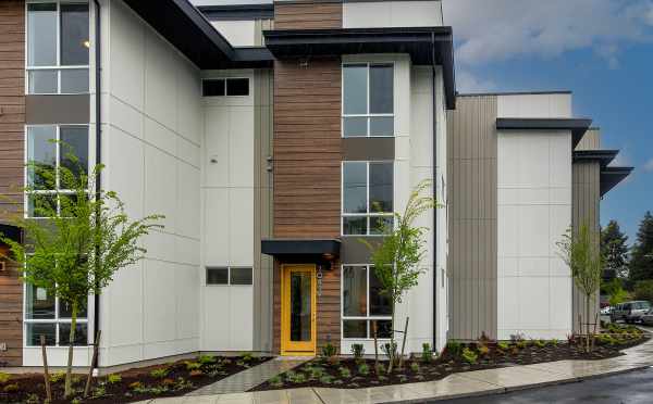 Front Exterior of 10419 Alderbrook Pl NW, One of the Zinnia Townhomes in the Flora Collection