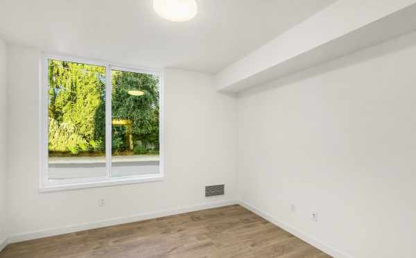 First-Floor Bedroom at 323 Malden Ave E, One of the Mika Townhomes by Isola Homes