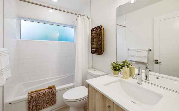 First-Floor Bathroom at 6317E 9th Ave NE in Zenith Towns North by Isola Homes