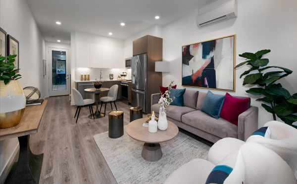 View from the Living Room to the Kitchen at 10429C Alderbrook Pl NW, One of the Jasmine Townhomes in the Flora Collection