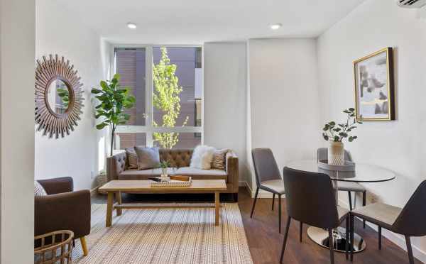 Living Room and Dining Area at 6317E 9th Ave NE, One of the Homes in Zenith Towns North in Roosevelt