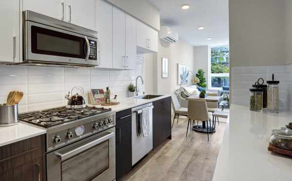 View from the Kitchen to the Dining Area in One of the Emory Townhomes in Green Lake