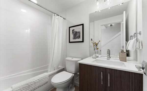 First-Floor Bathroom at 820 NE 63rd St, in Zenith Towns South by Isola Homes