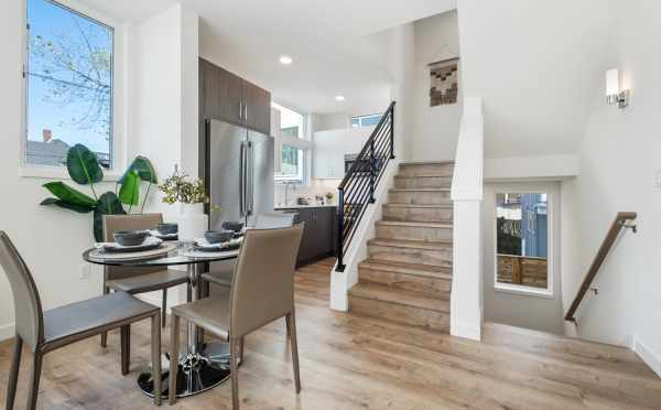 Dining Room and Kitchen at 1113A 14th Ave, One of the Corazon North Townhomes in Capitol Hill by Isola Homes