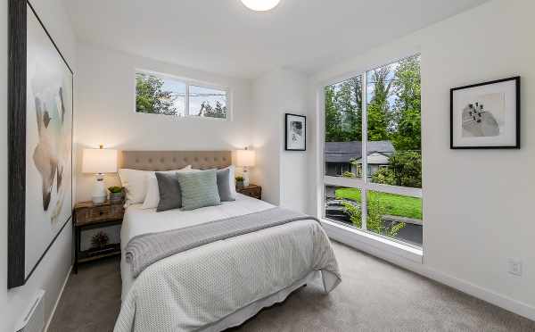 First Bedroom at 10419 Alderbrook Pl NW, One of the Zinnia Townhomes in the Flora Collection at Greenwood