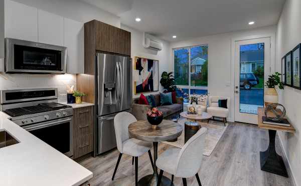 View from the Kitchen to the Living Room at 10429C Alderbrook Pl NW, One of the Jasmine Townhomes in the Flora Collection