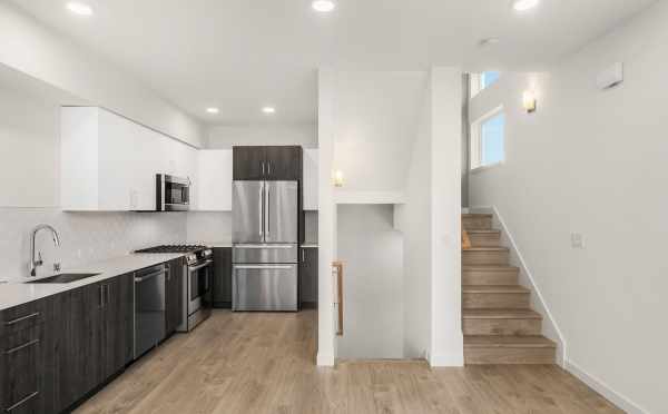 View of the Kitchen and the Stairs at 323 Malden Ave E