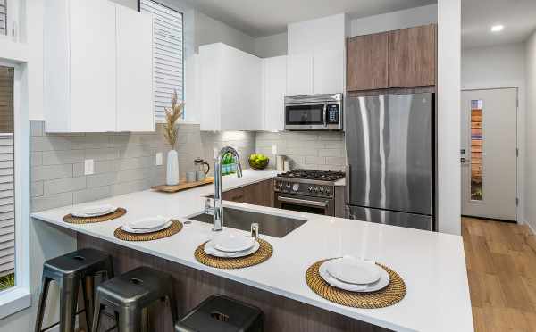 Kitchen at 8551A Midvale Ave N, One of the Fattorini Flats North Townhomes in Licton Springs