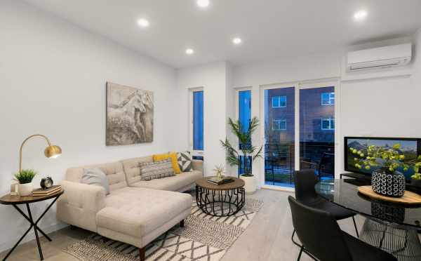 Living Room and Dining Area at 109A 22nd Ave, One of the Thalia Townhomes by Isola Homes