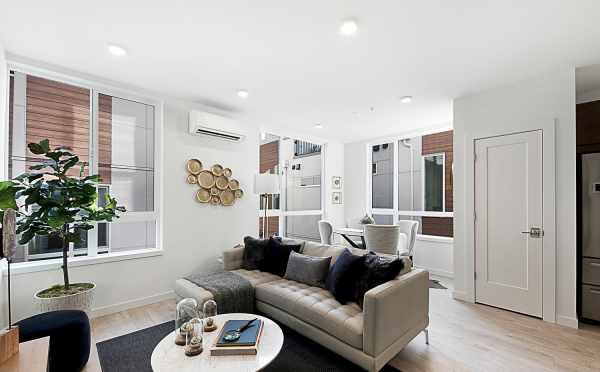 View of Living Room and Dining Room in 7528A 15th Ave NW, Townhome in Talta Ballard