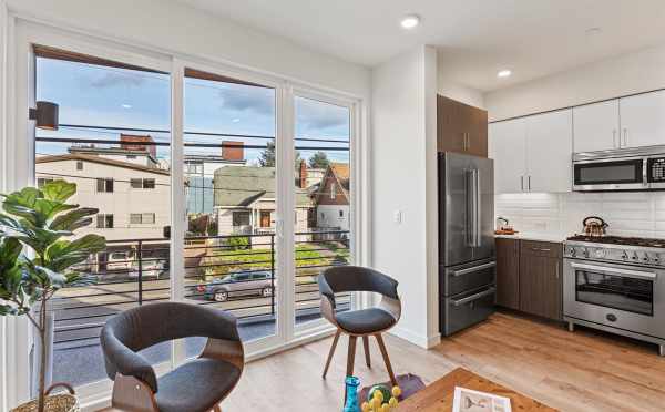 Living Room and Kitchen at 7213 5th Ave NE in Verde Towns 3 by Isola Homes