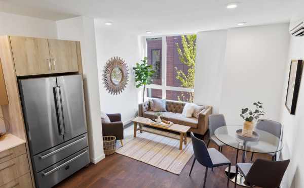 View of the Kitchen, Dining Area, and Living Room at 6317E 9th Ave NE