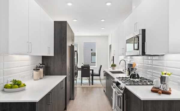 View from the Kitchen to the Dining Room at 212E 18th Ave in the Cabochon Collection by Isola Homes