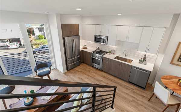 View from the Stairs to the Kitchen and Living Room at 7213 5th Ave NE in Verde Towns 3