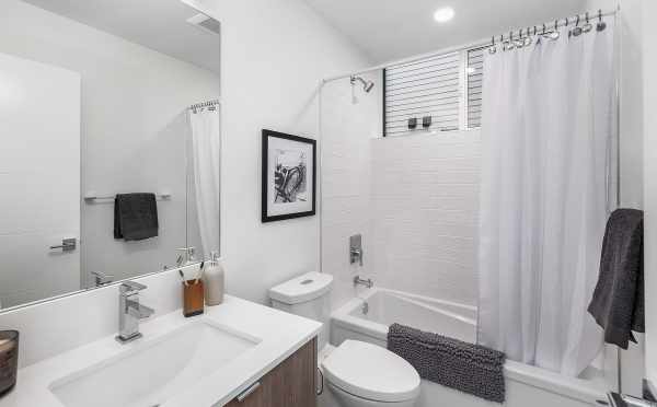 Second Bathroom at 8551A Midvale Ave N, One of the Fattorini Flats North Townhomes in Licton Springs