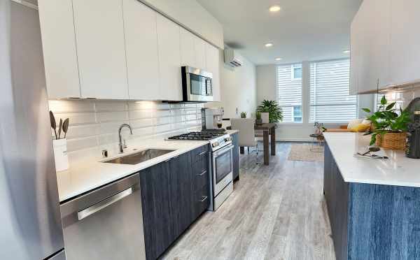 View from the Kitchen to the Dining Area and Living Room at 14339C Stone Ave N