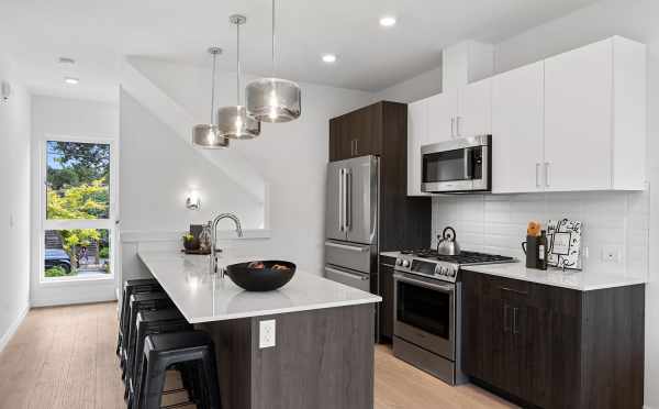 Kitchen at 6415 14th Ave NW, One of the Oleana Townhomes in Ballard by Isola Homes