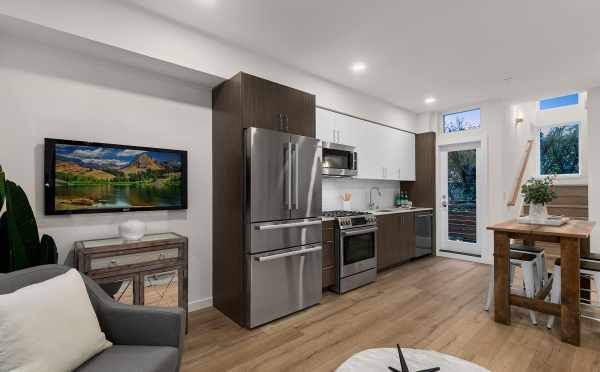 View from the Living Room to the Kitchen and Dining Area at 145 22nd Ave E