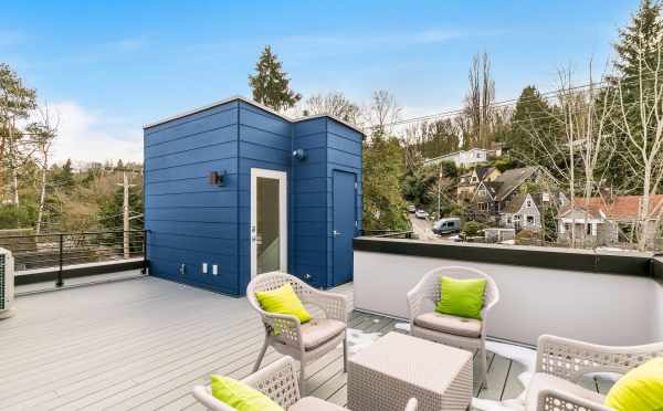 View of the Roof Deck Door from the Seating Area at 2430 Boyer Ave E