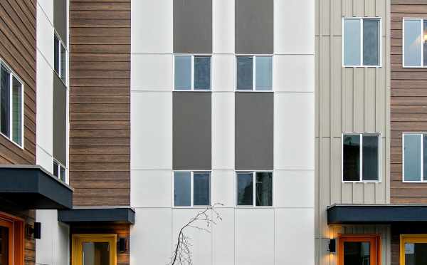 Rear Exterior and Parking Area at 10419 Alderbrook Pl NW, One of the Zinnia Townhomes in the Flora Collection at Greenwood