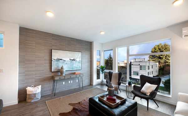 Tiled Accent Wall in the Living Room of One of the Twin II Duplexes