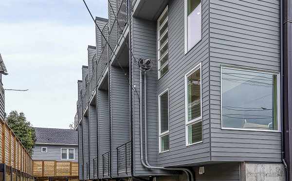 Back Exterior and Parking Garages at 4801C Dayton Ave N, One of the Ari Townhomes by Isola Homes in the Fremont Neighborhood of Seattle