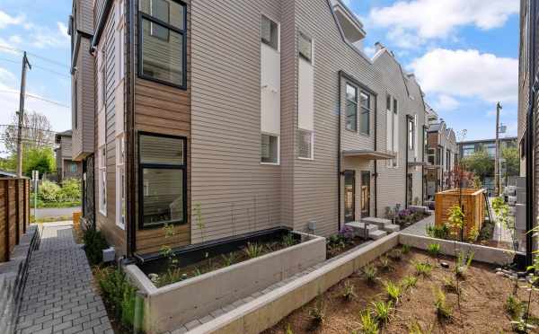 Walkway Between Buildings at the Cabochon Collection in the Central District by Isola Homes