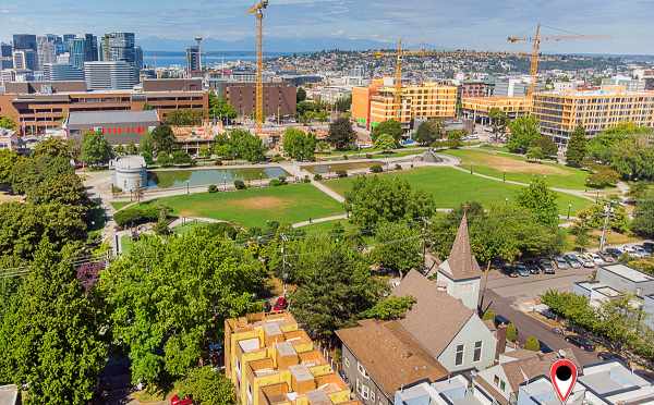 Aerial View of The Wyn Townhomes with Downtown Seattle and the Sound